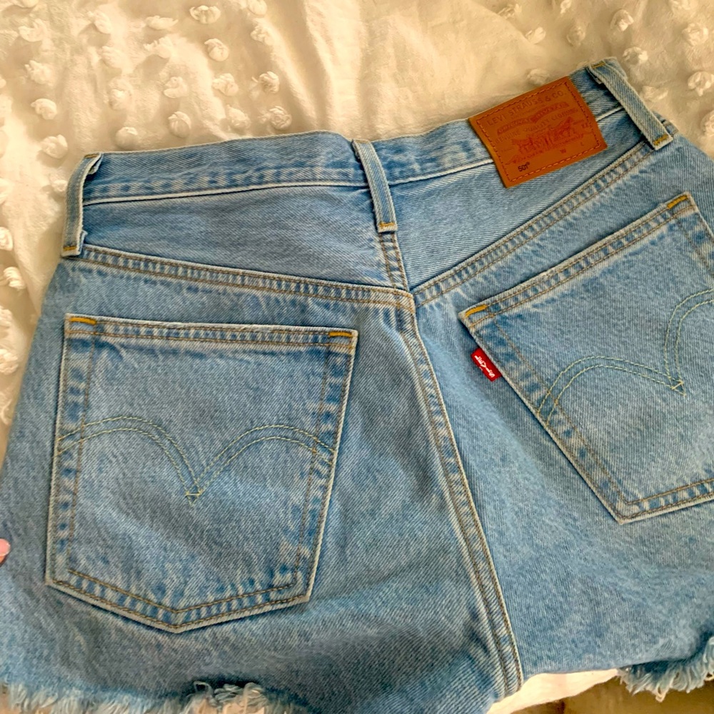 Levi’s high waisted cut off shorts. Barely worn, VERY sadly too small for me.